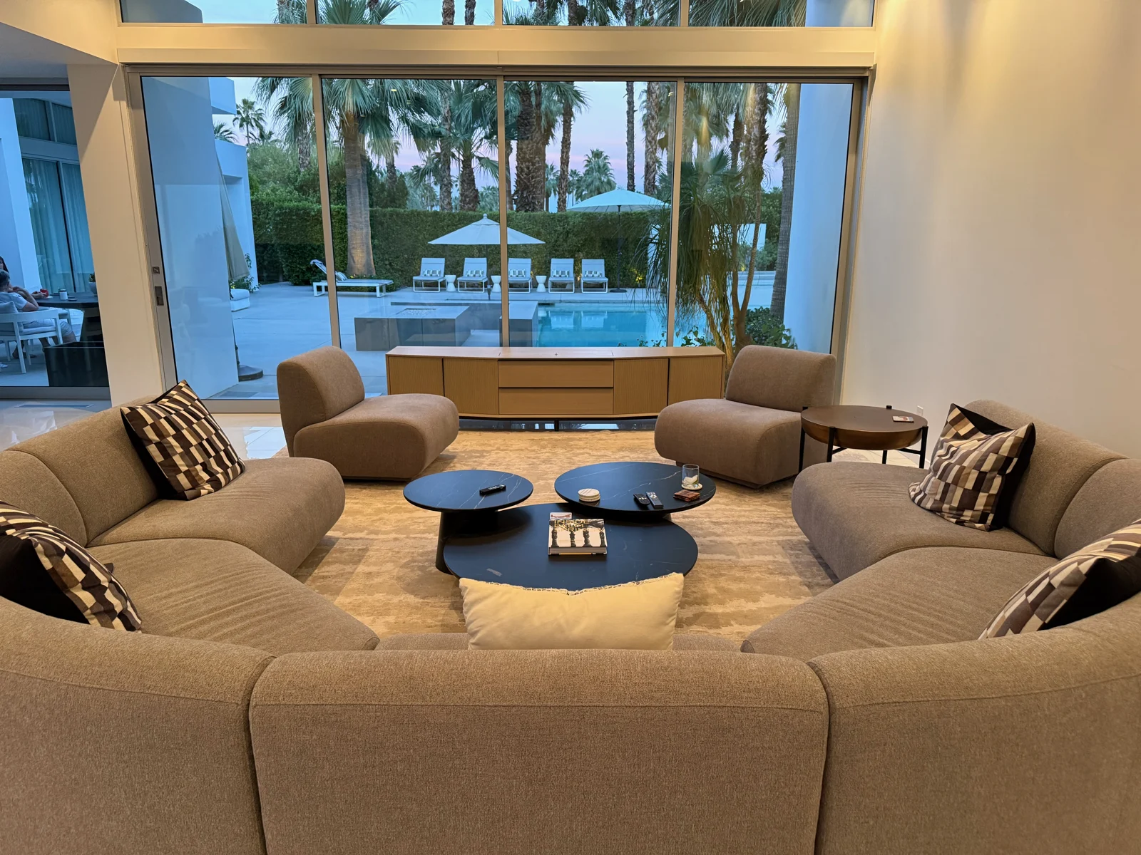 Crosby Credenza with its projection screen raised in a furnished living room